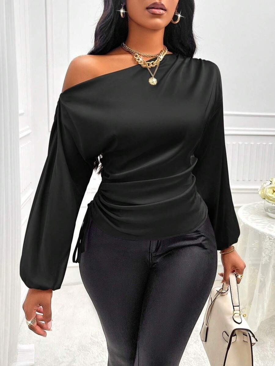 Blusa satinada de manga larga y cuello asimétrico