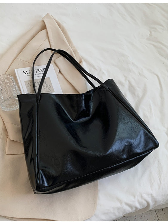 Bolso bandolera efecto piel