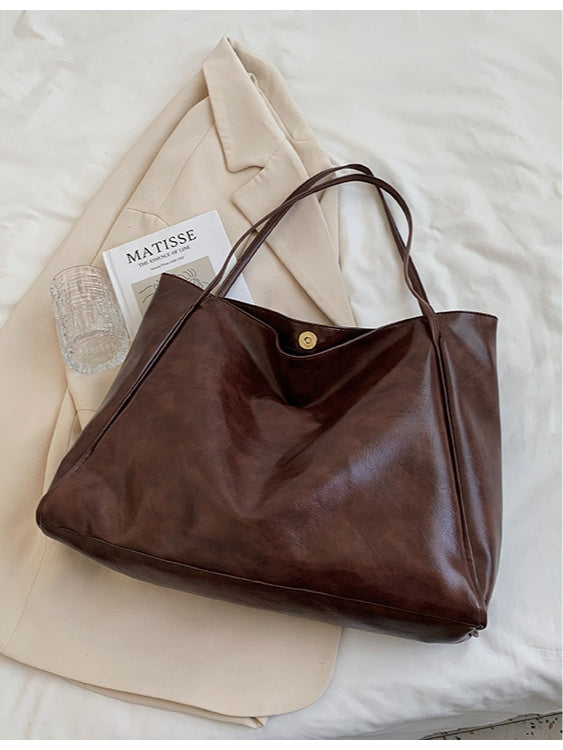 Bolso bandolera efecto piel