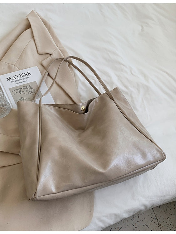 Bolso bandolera efecto piel