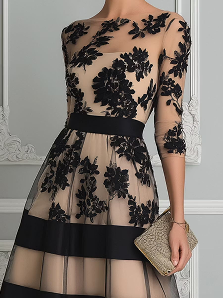 Vestido midi de encaje negro con corte evasé