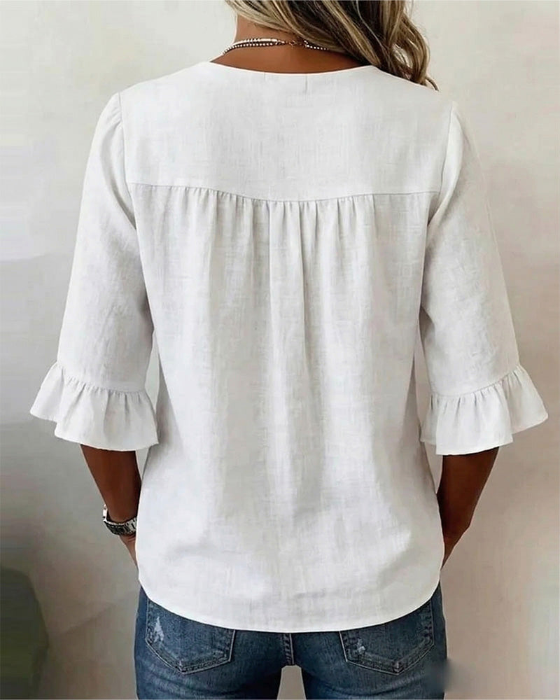 Sofía | Blusa de algodón y lino con botones efecto madera