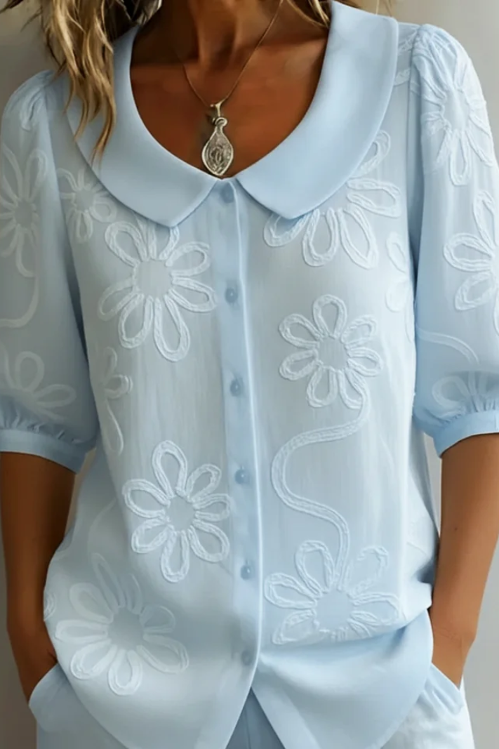 Blusa floral elegante