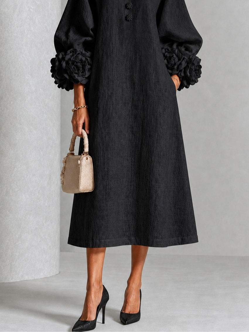 Vestido midi negro con botones y flores