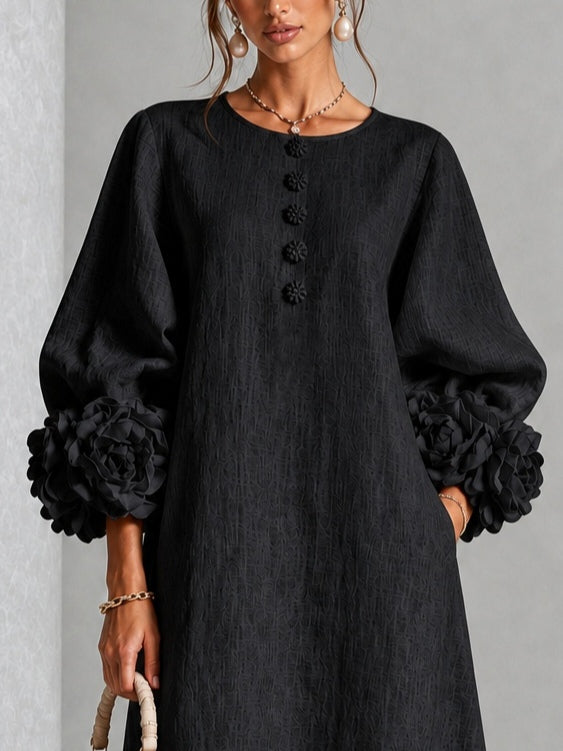Vestido midi negro con botones y flores