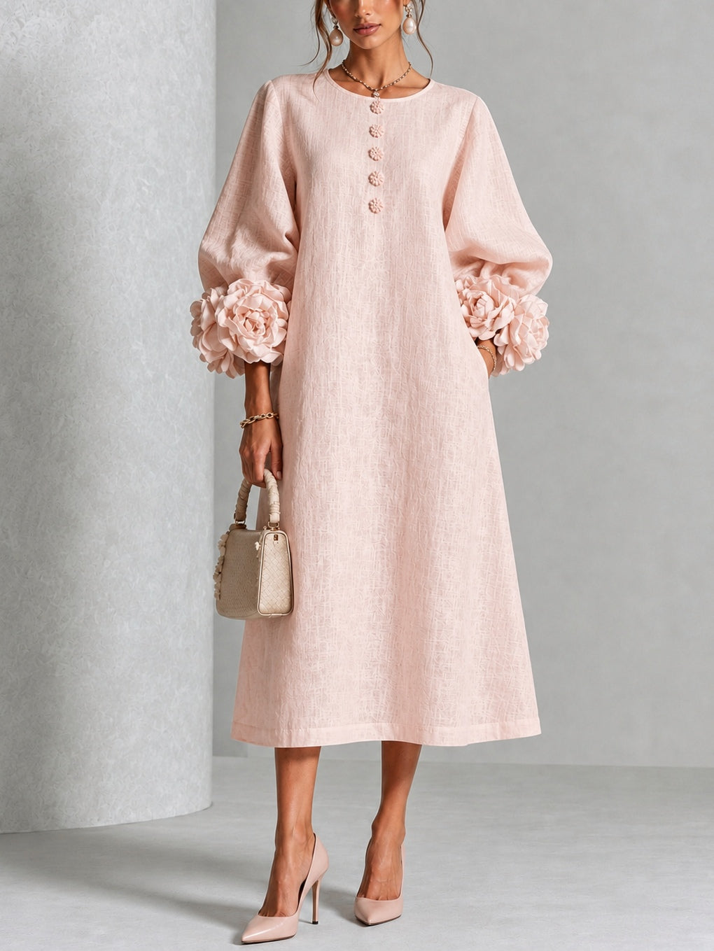 Vestido midi rosa con botones y flores