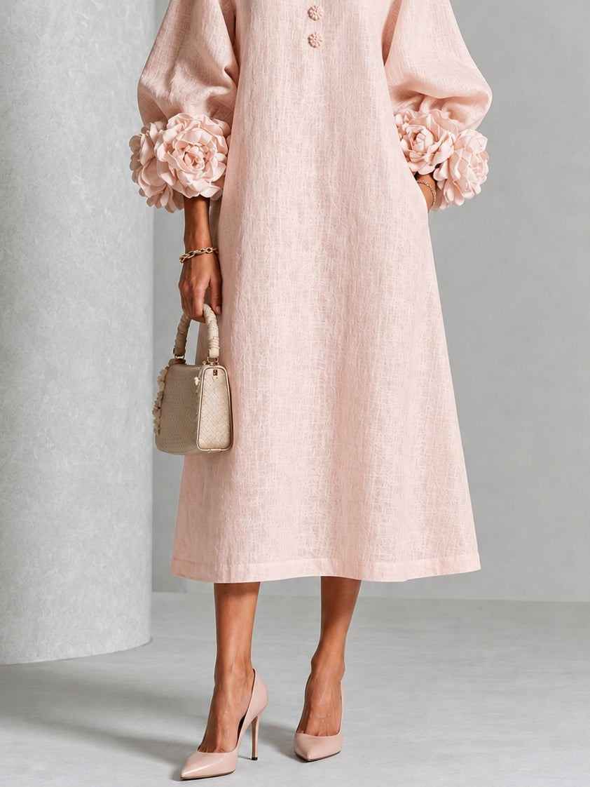 Vestido midi rosa con botones y flores