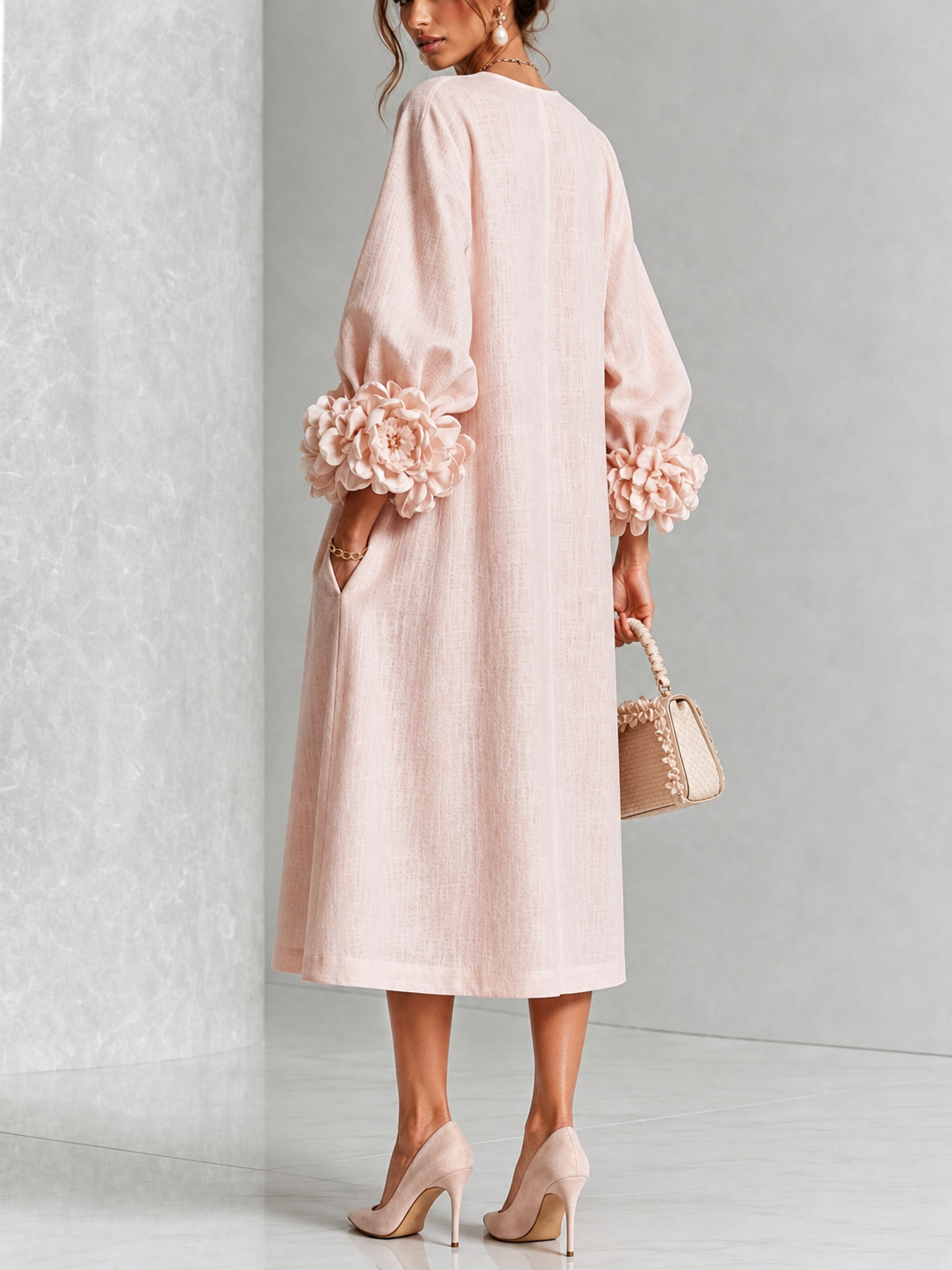 Vestido midi rosa con botones y flores