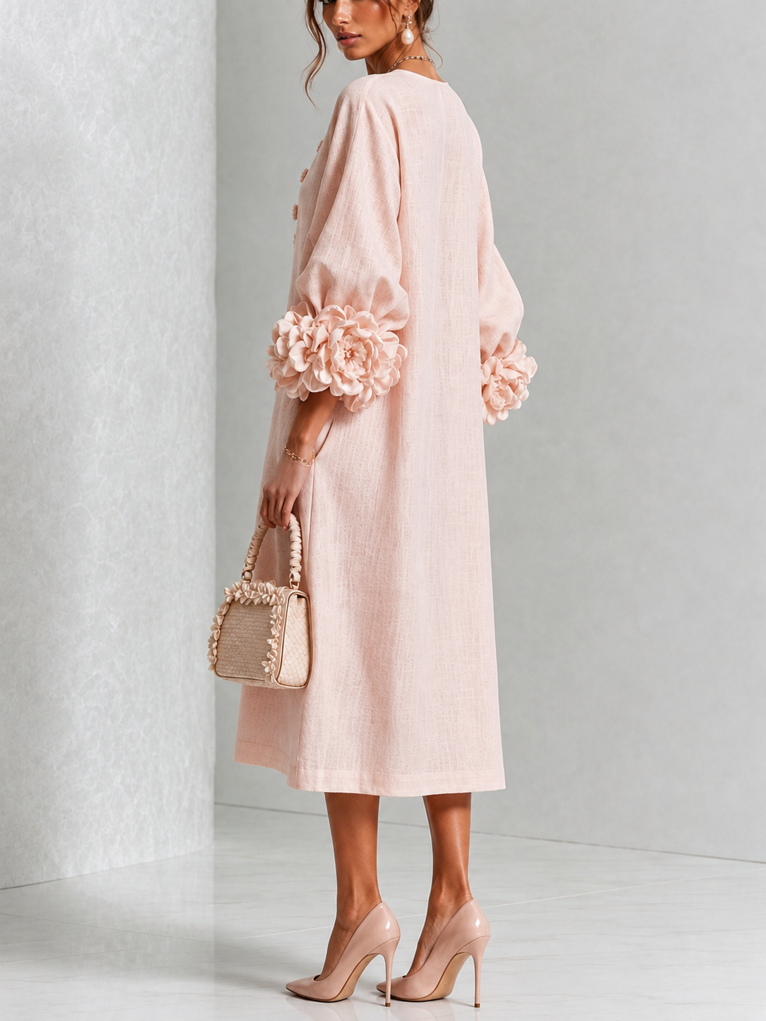 Vestido midi rosa con botones y flores