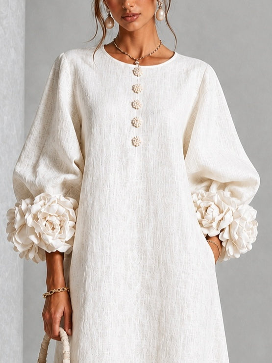 Vestido midi blanco con botones y flores