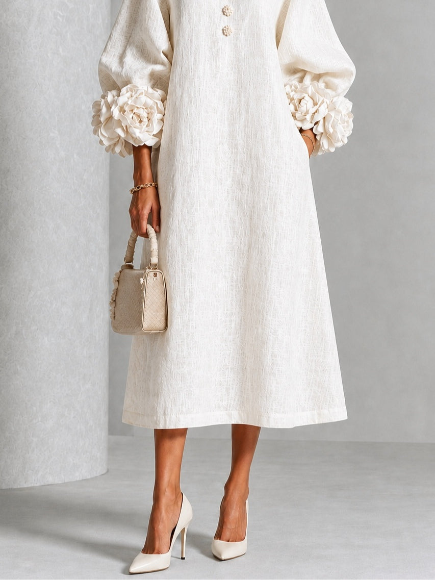 Vestido midi blanco con botones y flores