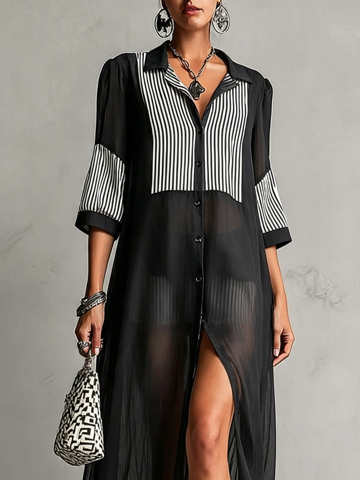 Vestido de chifón negro con botones y mangas tres cuartos